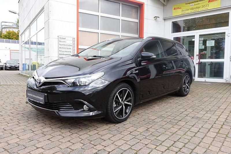 Mysticschwarzmet. Gebraucht 2017 Toyota Auris Hybrid Edition-S Kombi | 12.900 € (Fairer Preis) - Bild 1/4