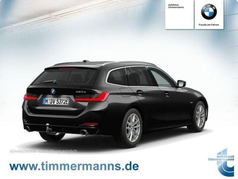 Gebraucht BMW 320e 204 PS (150 kW) 2022 Saphirschwarz (metallic) Kombi