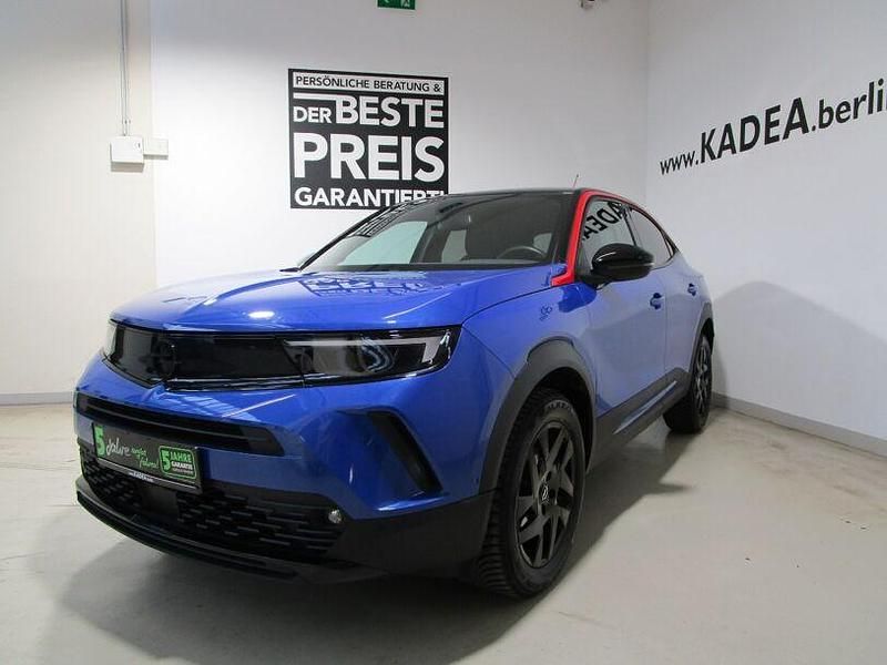Gebraucht Opel Mokka 131 PS (96 kW) 2023 Lackierung voltaic blue met/ty SUV