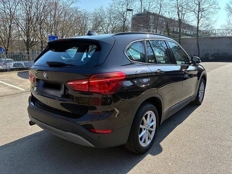 Używany BMW X1 Advantage 150 KM (110 kW) 2016 Brązowy SUV