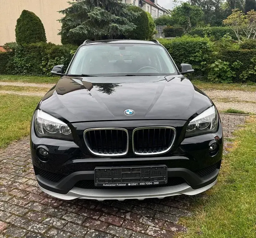 Używany BMW X1 116 KM (85 kW) 2014 Czarny SUV