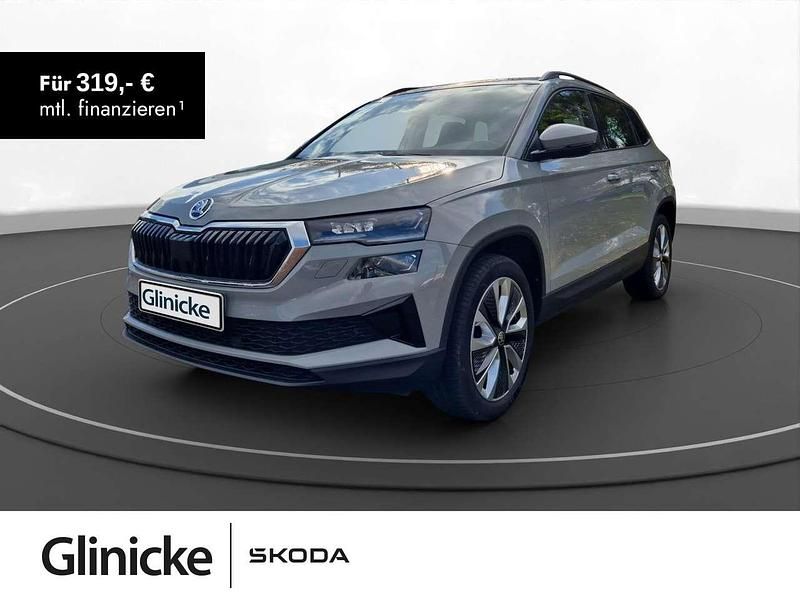 Grau Gebraucht 2022 Skoda Karoq SUV | 26.870 € (Fairer Preis) - Bild 1/3
