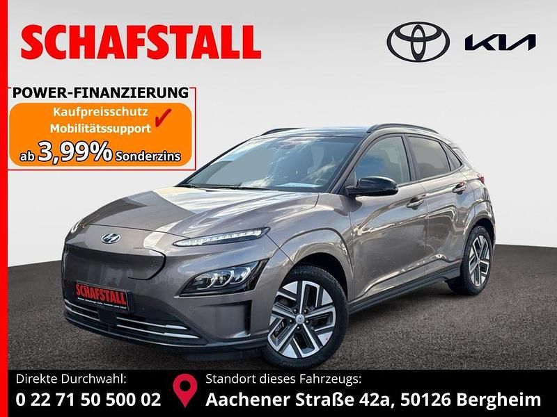 Braun (silky bronze / phantom black / met) Gebraucht 2022 Hyundai Kona Trend SUV | 17.979 € (Guter Preis) - Bild 1/3