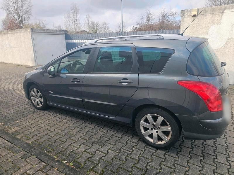 Gebraucht Peugeot 308 114 PS (83 kW) 2013 Grau Kombi