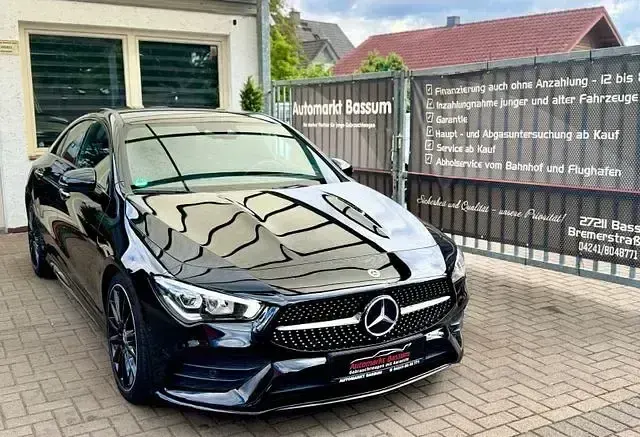 Gebraucht Mercedes CLA200 AMG line 150 PS (110 kW) 2023 Nachtschwarz (metallic) Coupé