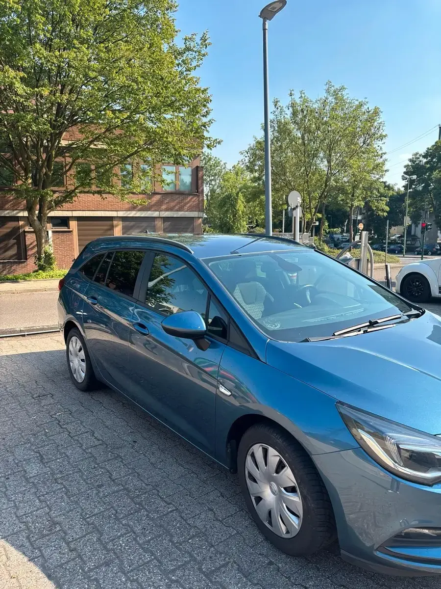 Gebraucht Opel Astra Business 135 PS (99 kW) 2017 Blau Kombi
