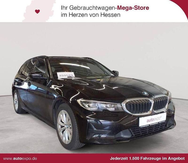 Schwarz Gebraucht 2021 BMW 320e Advantage Kombi | 20.989 € (Fairer Preis) - Bild 1/4