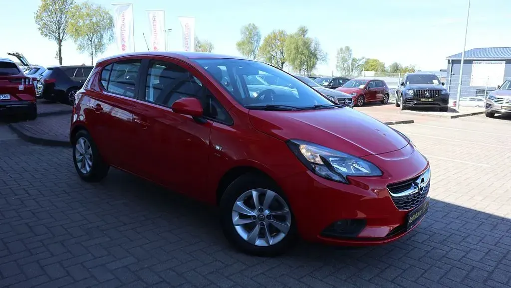Używany Opel Corsa drive 101 KM (74 kW) 2016 Czerwony Hatchback