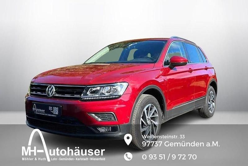 Ruby red metallic Gebraucht 2017 VW Tiguan Sound SUV | 23.290 € (Guter Preis) - Bild 1/4