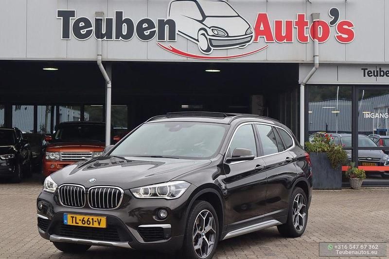 Braun Gebraucht 2018 BMW X1 Executive SUV | 14.895 € (Superpreis) - Bild 1/4