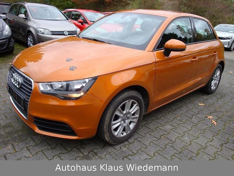 Orange Gebraucht 2012 Audi A1 Sportback Attraction Kleinwagen | 10.999 € (Fairer Preis) - Bild 1/4
