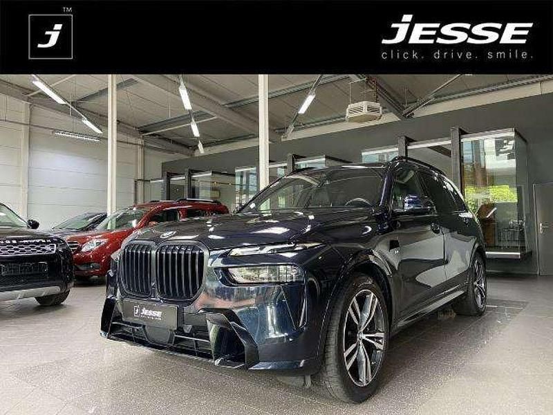 Carbonschwarz metallic (metallic) Gebraucht 2023 BMW X7 Sport Line SUV | 78.990 € (Guter Preis) - Bild 1/4