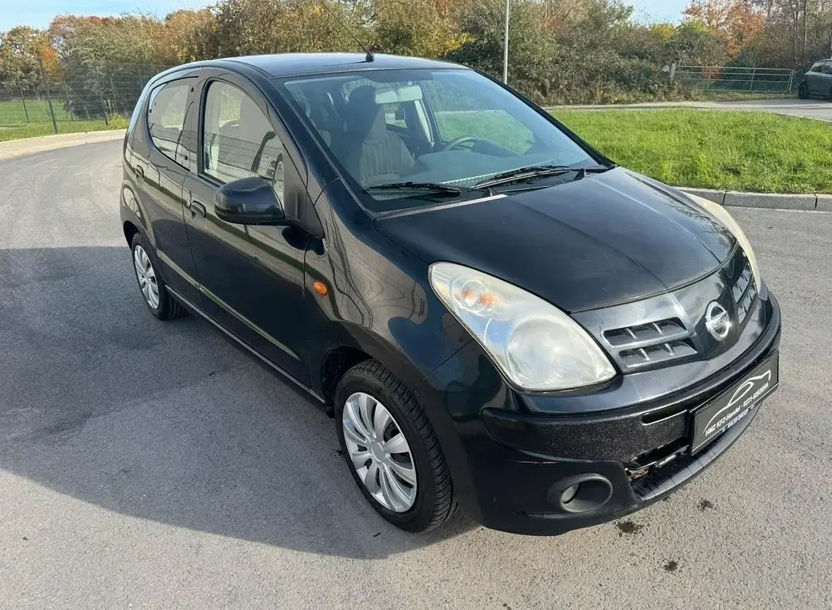 Gebraucht Nissan Pixo Acenta 69 PS (50 kW) 2010 Schwarz Kleinwagen