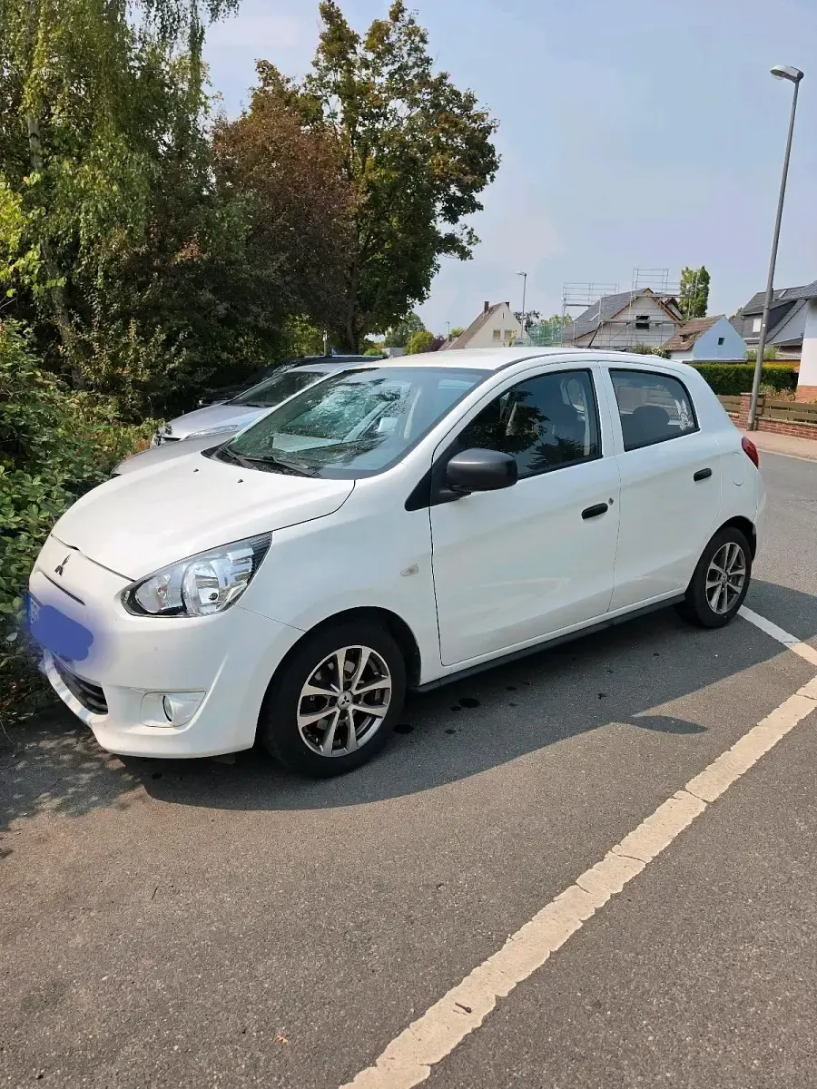 Gebraucht Mitsubishi Space Star 71 PS (52 kW) 2015 Weiß Kleinwagen