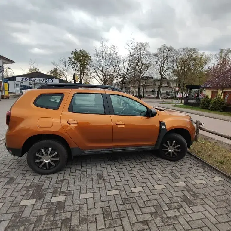 Używany Dacia Duster 101 KM (74 kW) 2020 Pomarańczowy SUV