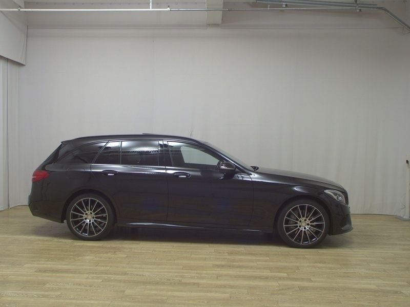 Schwarz Gebraucht 2015 Mercedes C400 AMG line Kombi | 20.890 € (Superpreis) - Bild 1/4