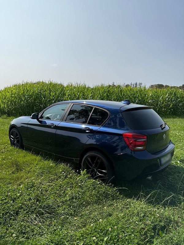 Second-hand BMW 118 143 CP (105 kW) 2012 Albastru Hatchback