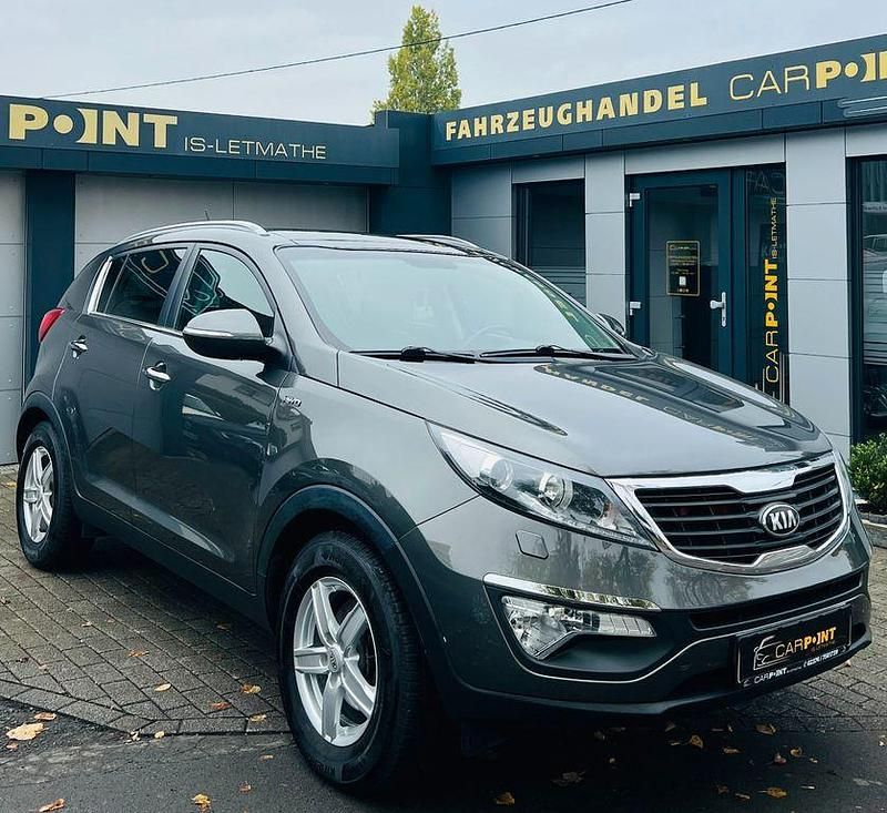 Grau Gebraucht 2013 Kia Sportage Spirit SUV | 10.999 € (Fairer Preis) - Bild 1/4