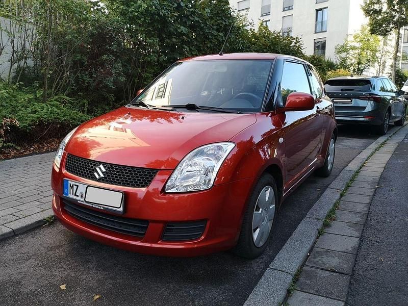 Orange Gebraucht 2010 Suzuki Swift Club Limousine | 2.800 € (Fairer Preis) - Bild 1/4