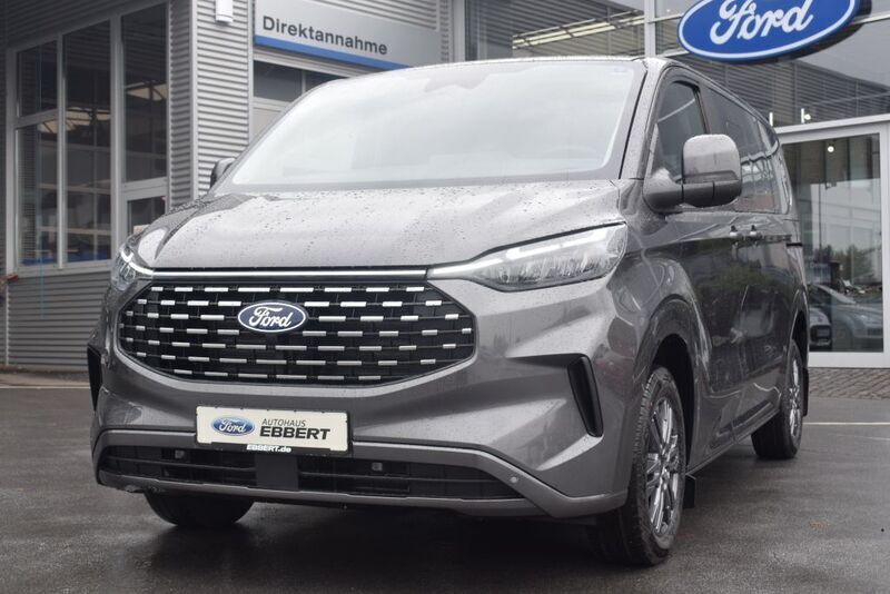 Grau Neu 2025 Ford Tourneo Custom Titanium Van / Kleinbus | 55.950 € (Fairer Preis) - Bild 1/4