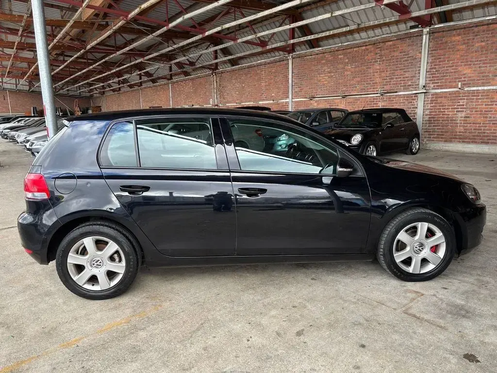 Second-hand VW Golf Style 90 CP (66 kW) 2009 Negru Monovolum