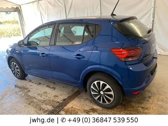 Gebraucht Dacia Sandero Expression 91 PS (66 kW) 2024 Blau (metallic) Limousine