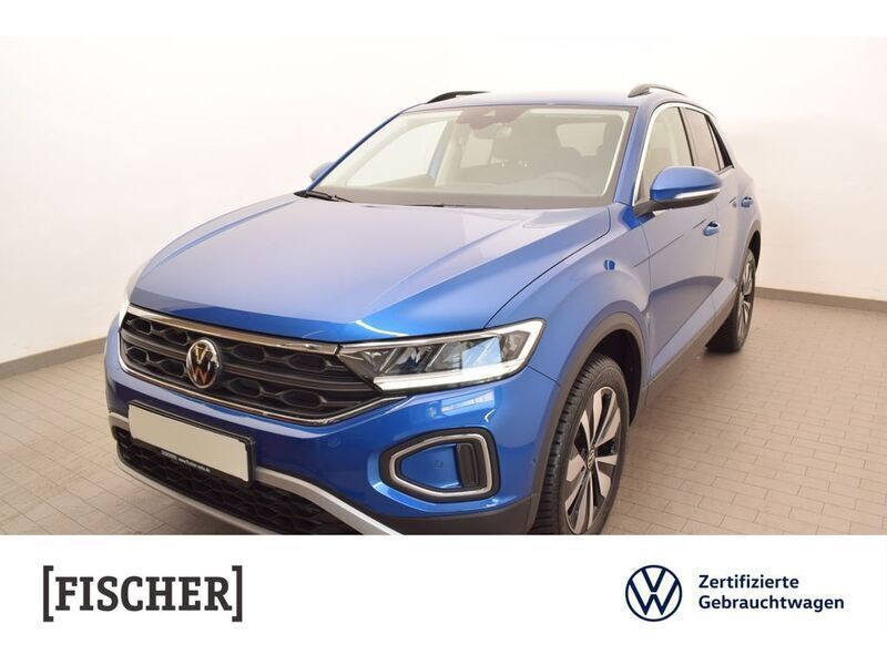 Ravennablau metallic Gebraucht 2024 VW T-Roc Move SUV | 31.876 € (Fairer Preis) - Bild 1/4