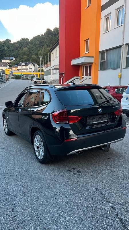 Używany BMW X1 177 KM (130 kW) 2011 Czarny SUV
