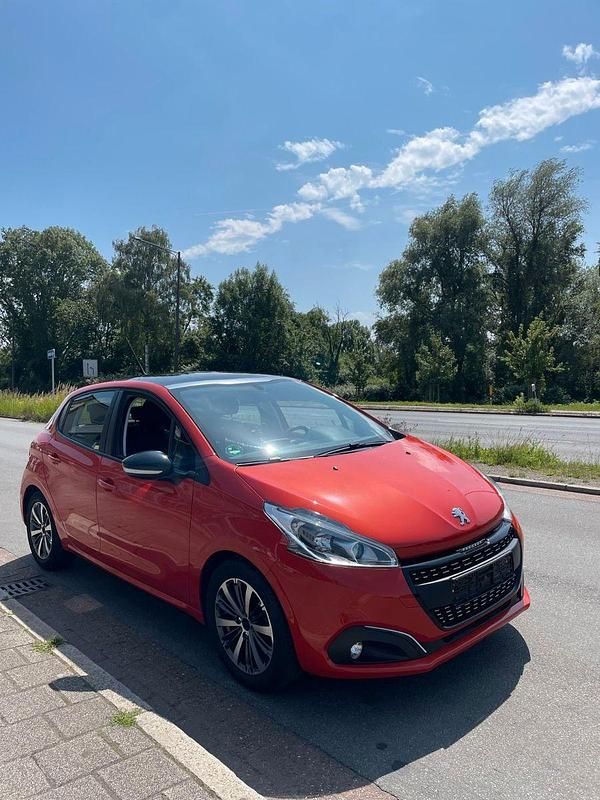 Gebraucht Peugeot 208 Active 82 PS (60 kW) 2017 Orange Kleinwagen