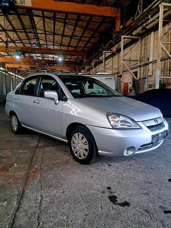 Silber Gebraucht 2005 Suzuki Liana Kleinwagen | 1.500 € - Bild 1/4