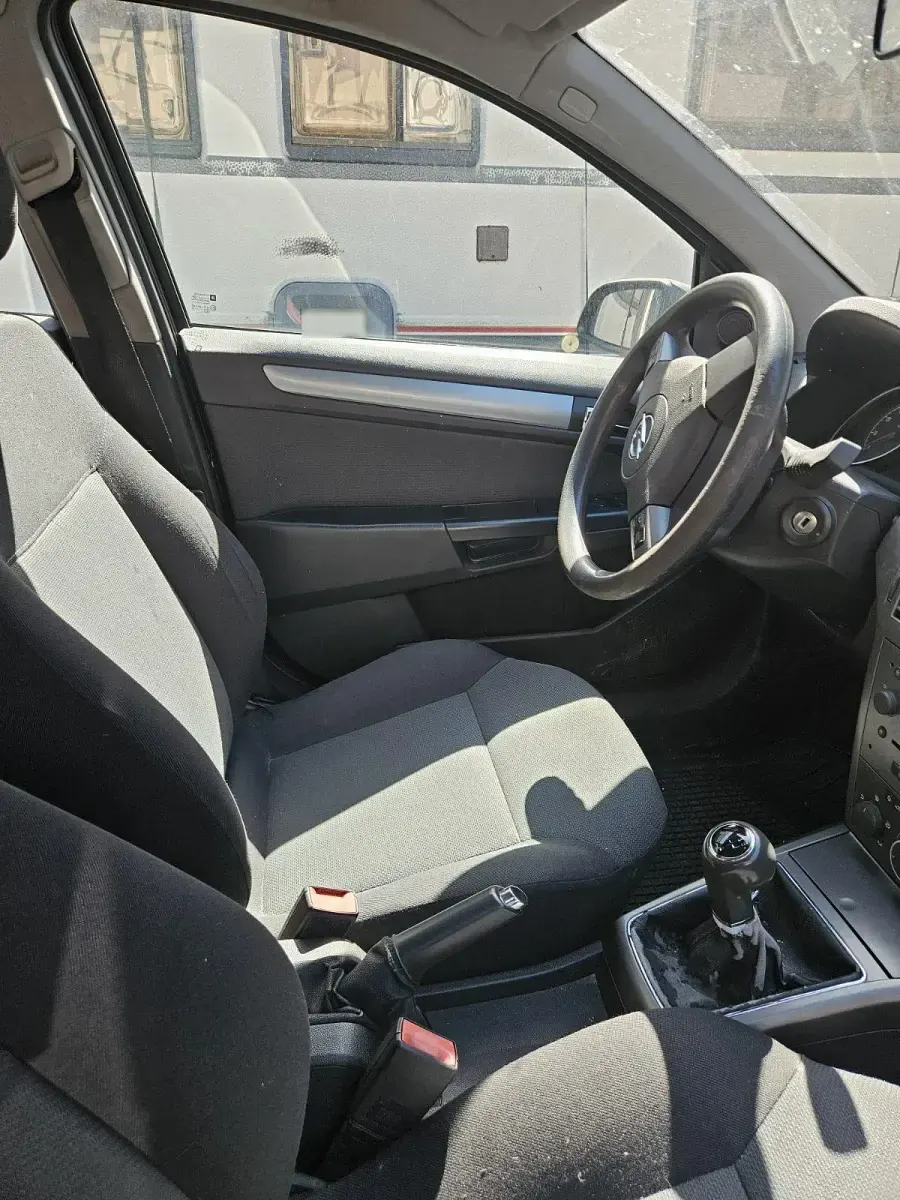 Używany Opel Astra 101 KM (74 kW) 2006 Czarny Kombi