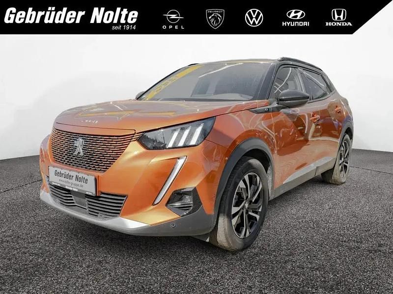 Orange / orange fusion Gebraucht 2021 Peugeot e-2008 GT-line SUV | 18.990 € (Fairer Preis) - Bild 1/4