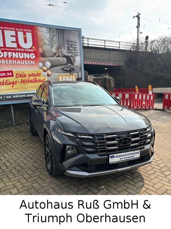Ecotronic grey / mic Gebraucht 2024 Hyundai Tucson Trend SUV | 35.990 € (Etwas zu teuer) - Bild 1/4