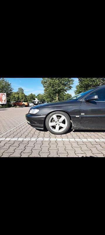 Gebraucht Opel Omega Design Edition 144 PS (105 kW) 2001 Schwarz Kombi