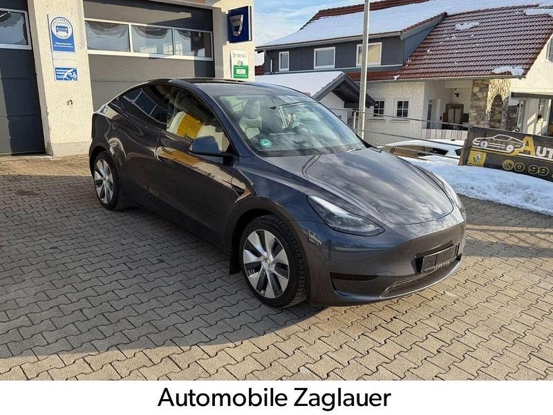 Grau Gebraucht 2023 Tesla Model Y RWD SUV | 30.990 € (Fairer Preis) - Bild 1/4