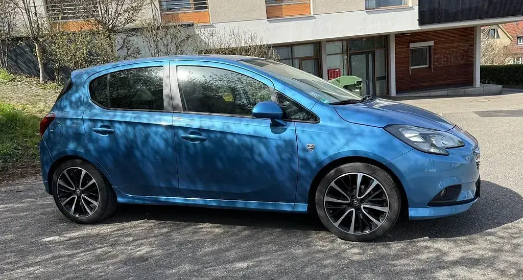 Używany Opel Corsa drive 69 KM (50 kW) 2015 Niebieski Hatchback