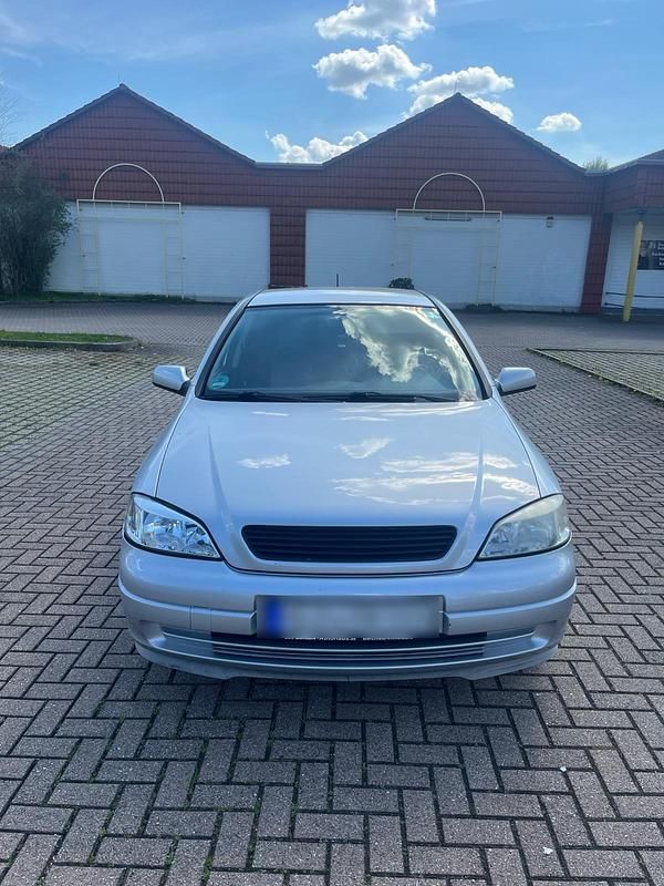 Second-hand Opel Astra 101 CP (74 kW) 2002 Argintiu Coupe