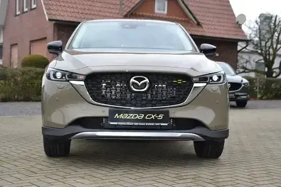 Gebraucht Mazda CX-5 Newground 184 PS (135 kW) 2022 Zircon sand (metallic) SUV