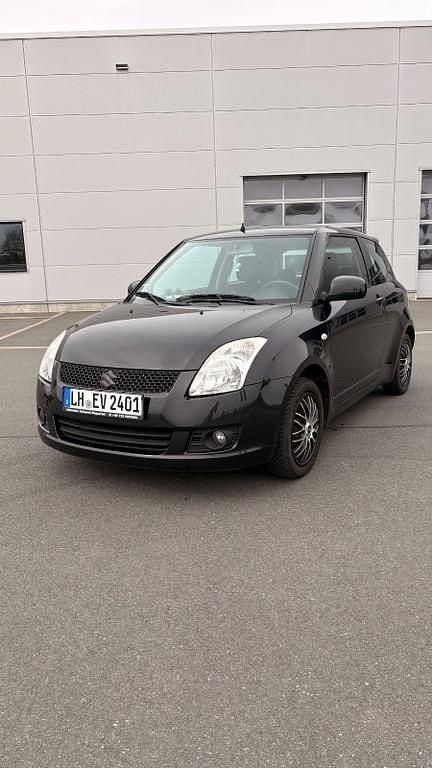 Second-hand Suzuki Swift 92 CP (67 kW) 2008 Negru Hatchback