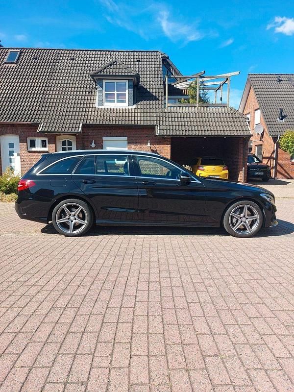 Schwarz Gebraucht 2015 Mercedes C400 AMG line Kombi | 24.200 € (Fairer Preis) - Bild 1/4