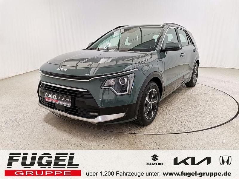 Cityscape grün met. Gebraucht 2023 Kia Niro Comfort SUV | 29.469 € (Guter Preis) - Bild 1/4