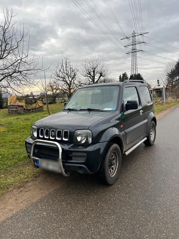 Schwarz Gebraucht 2007 Suzuki Jimny Club SUV | 6.900 € (Fairer Preis) - Bild 1/4