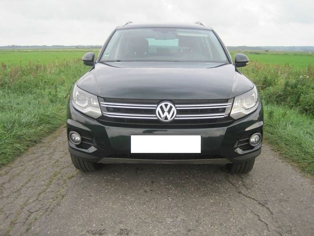 Grün metallic Gebraucht 2012 VW Tiguan Track & Field SUV | 15.500 € - Bild 1/4