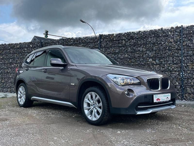 Braun Gebraucht 2011 BMW X1 Performance SUV | 11.690 € (Fairer Preis) - Bild 1/4
