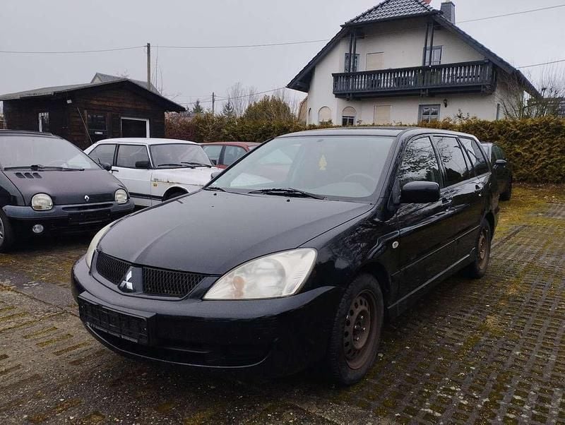 Pantherschwarz (p) Gebraucht 2007 Mitsubishi Lancer Invite Kombi | 399 € (Superpreis) - Bild 1/4