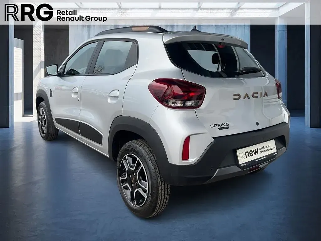 Gebraucht Dacia Spring Extreme 19 kW (26 PS) 2024 Diamantsilbergrau Kleinwagen