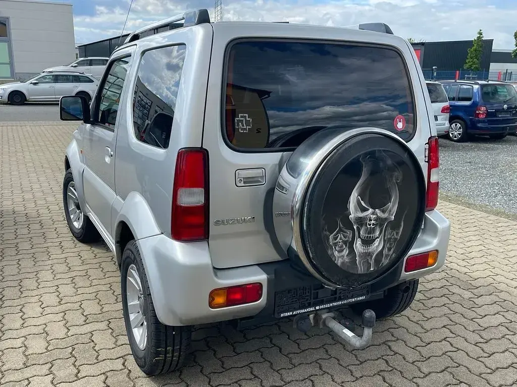 Używany Suzuki Jimny Style 86 KM (63 kW) 2012 Srebrny SUV