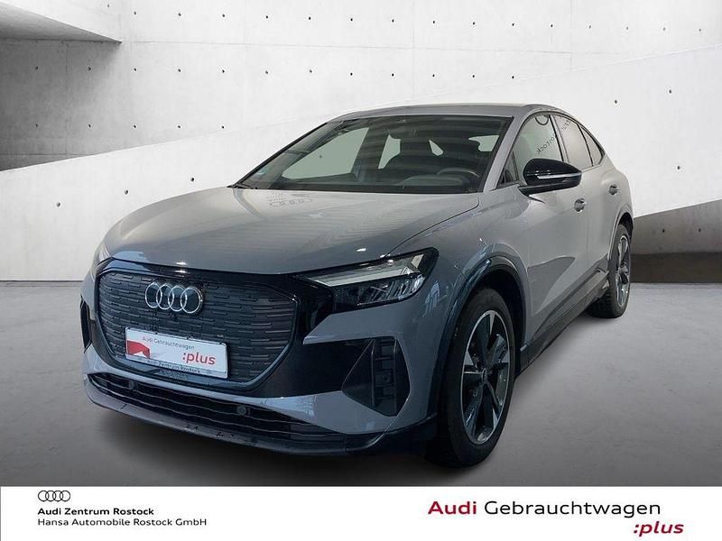 Grau Gebraucht 2022 Audi Q4 Sportback e-tron Sport SUV | 31.990 € (Etwas zu teuer) - Bild 1/4