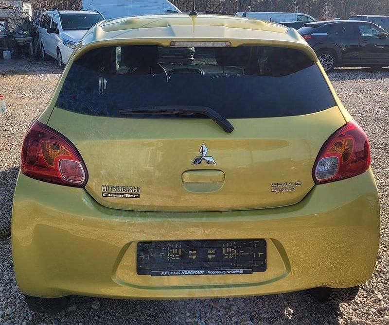 Gebraucht Mitsubishi Space Star 80 PS (58 kW) 2014 Gelb Van / Kleinbus