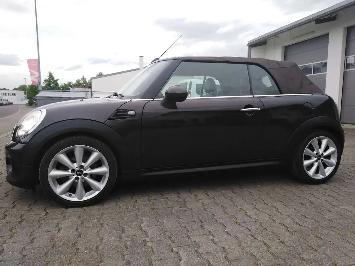 Gebraucht Mini Cooper Cabriolet 122 PS (89 kW) 2013 Iced chocolate metallic Cabrio